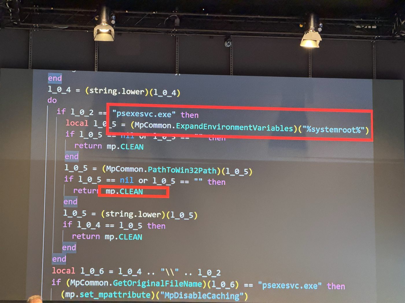 Decompiled LUA rule code showing a check for psexesvc.exe under %systemroot% that returns mp.CLEAN