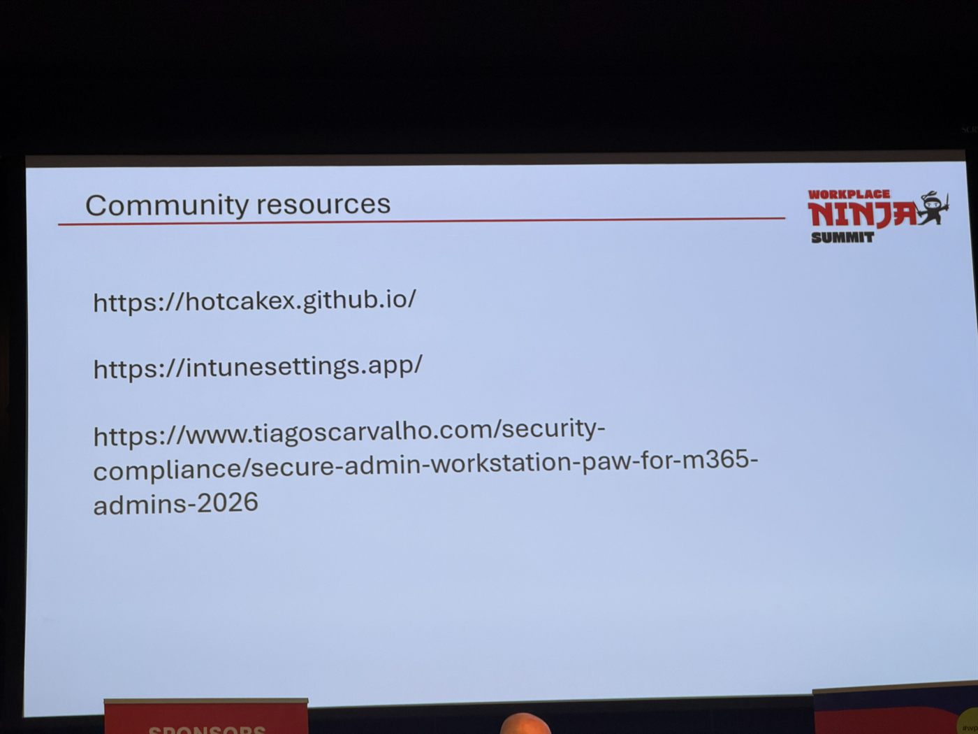 Slide titled "Community resources" listing three URLs: hotcakex.github.io, intunesettings.app and a tiagoscarvalho.com article on secure admin workstations for M365 admins
